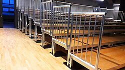 Mobile grandstand with compact railing