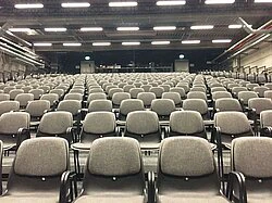 Stacking chairs "Pro Comfort" with upholstery