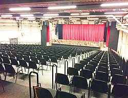 Stacking chairs "Pro Comfort" with upholstery