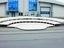 Stage with radius