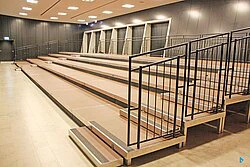 Mobile grandstand with plug-in railing