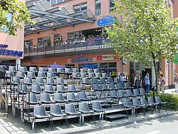 Grey stacking chairs