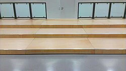 Mobile grandstand with glass railing