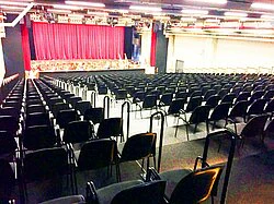 Stacking chairs "Pro Comfort" with upholstery