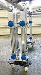 Trapezoidal scooter & telescopic leg on a rolling stage